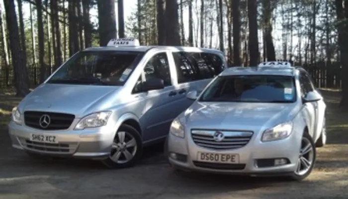 Aviemore Taxis vehicles parked together